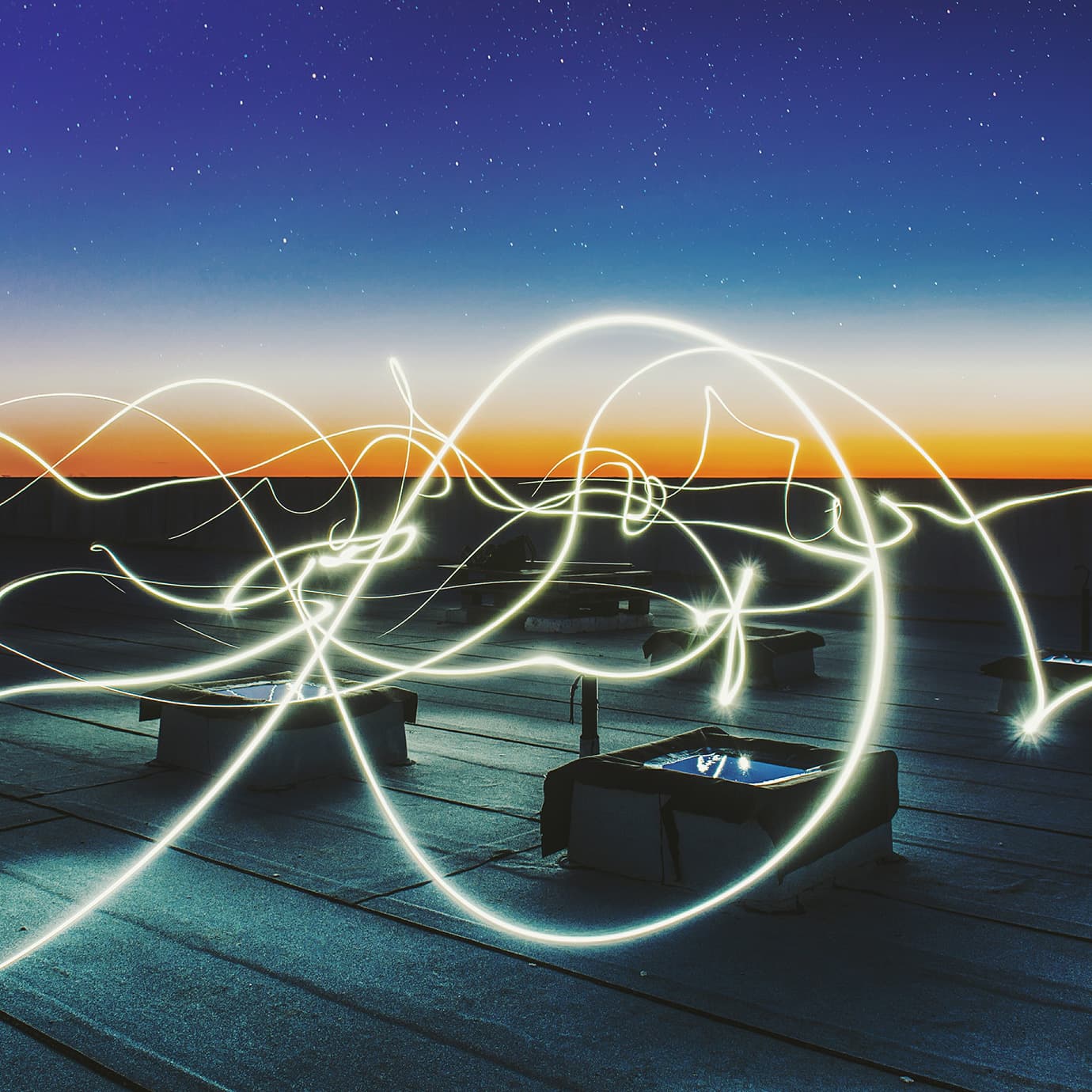 Trails of light and energy floating in the sky