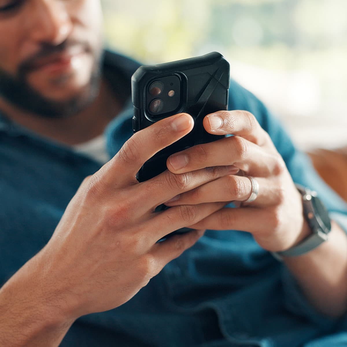 Business owner using a smartphone